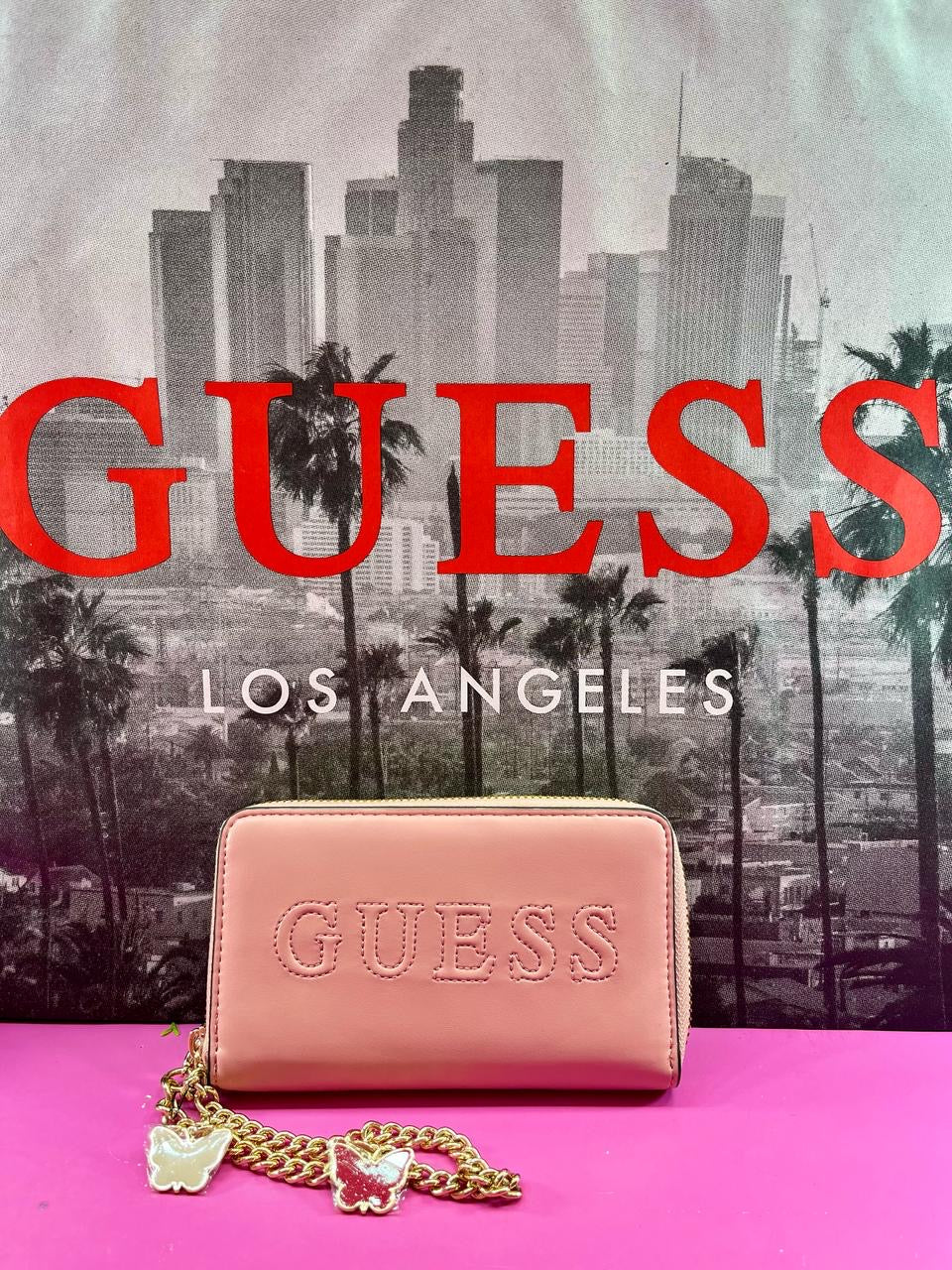 Cartera “Guess” Rosa.