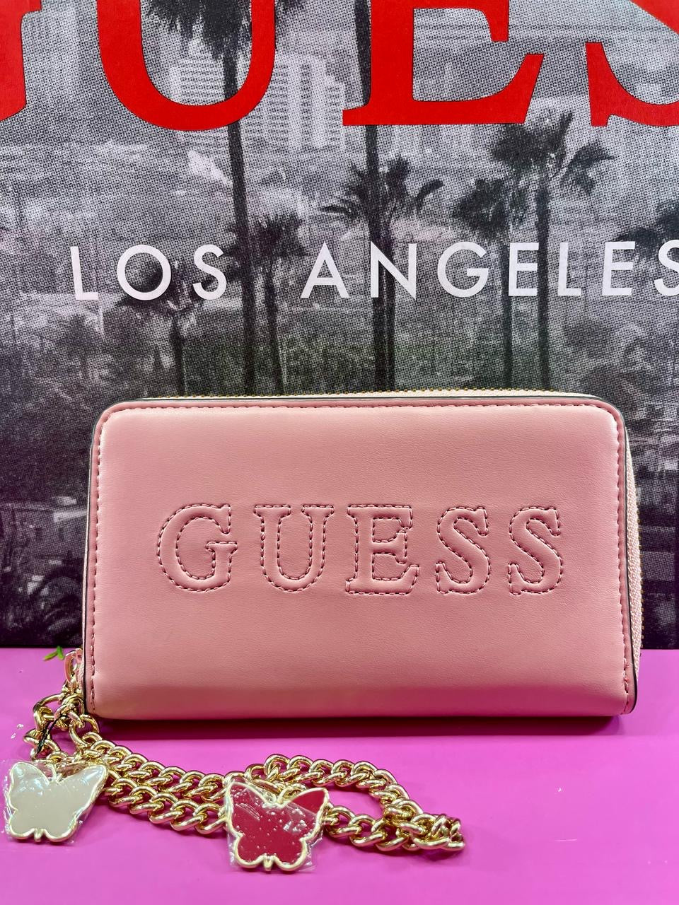 Cartera “Guess” Rosa.