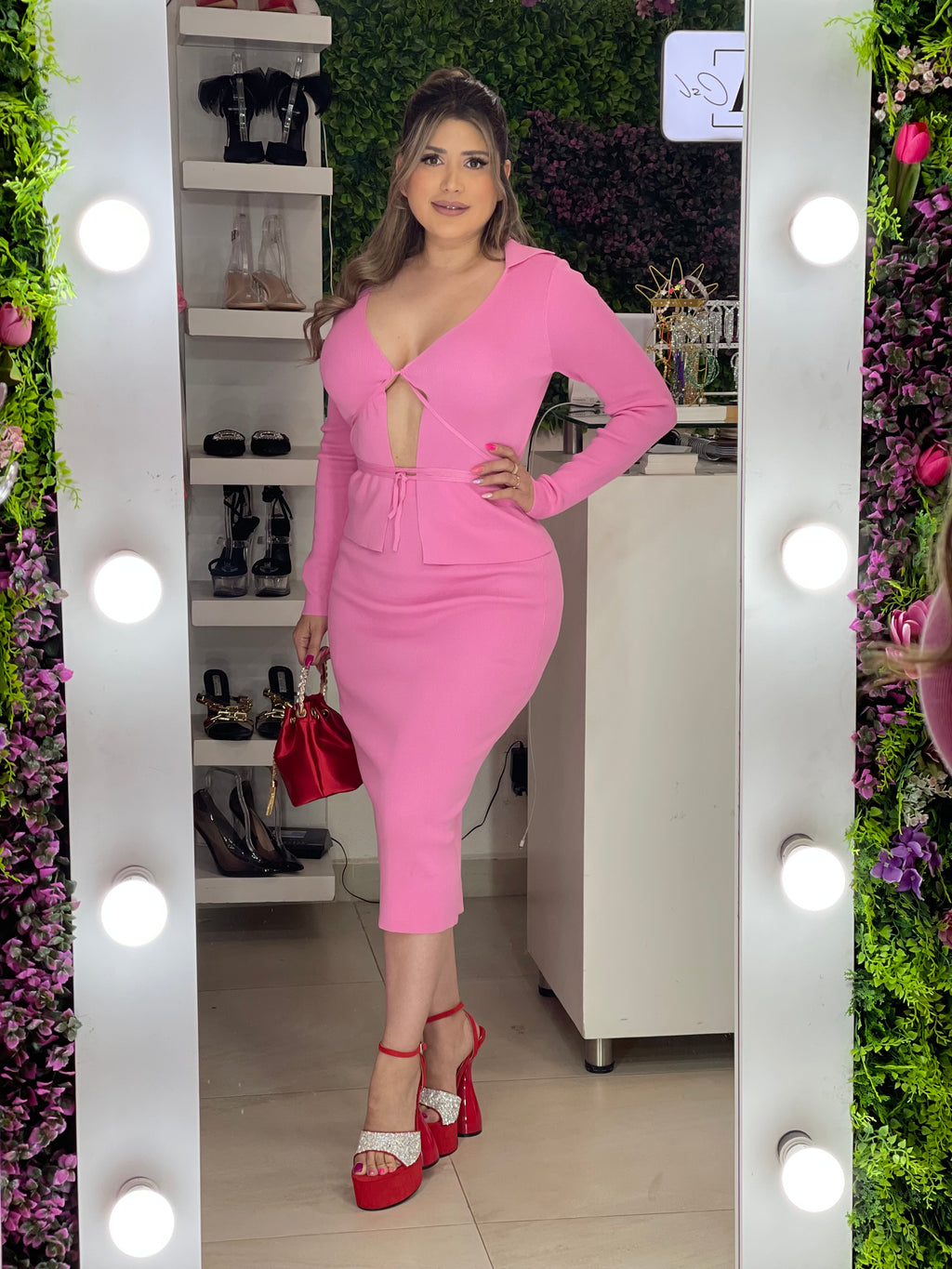 Set rosa de falda y top manga larga