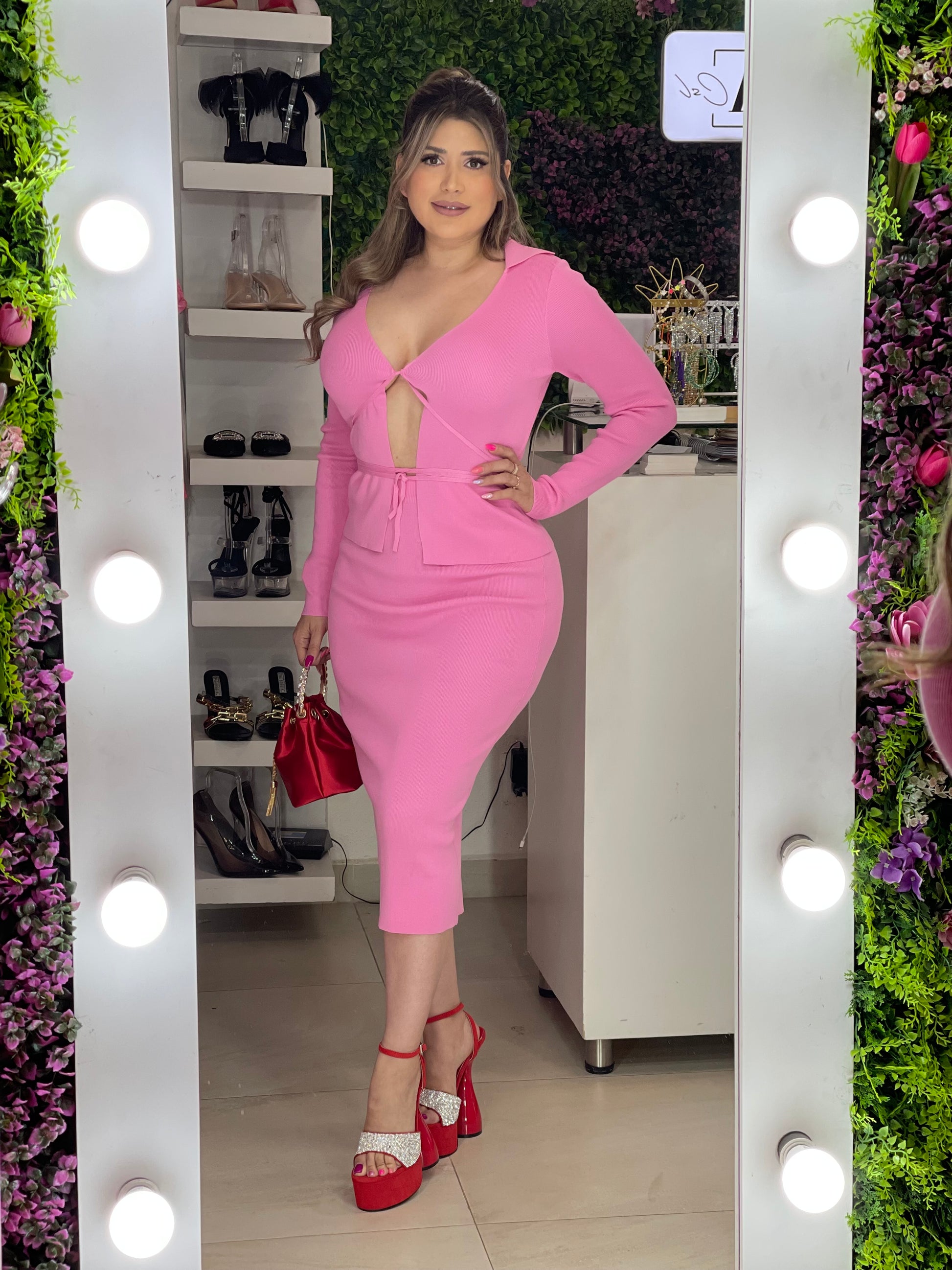 Set rosa de falda y top manga larga