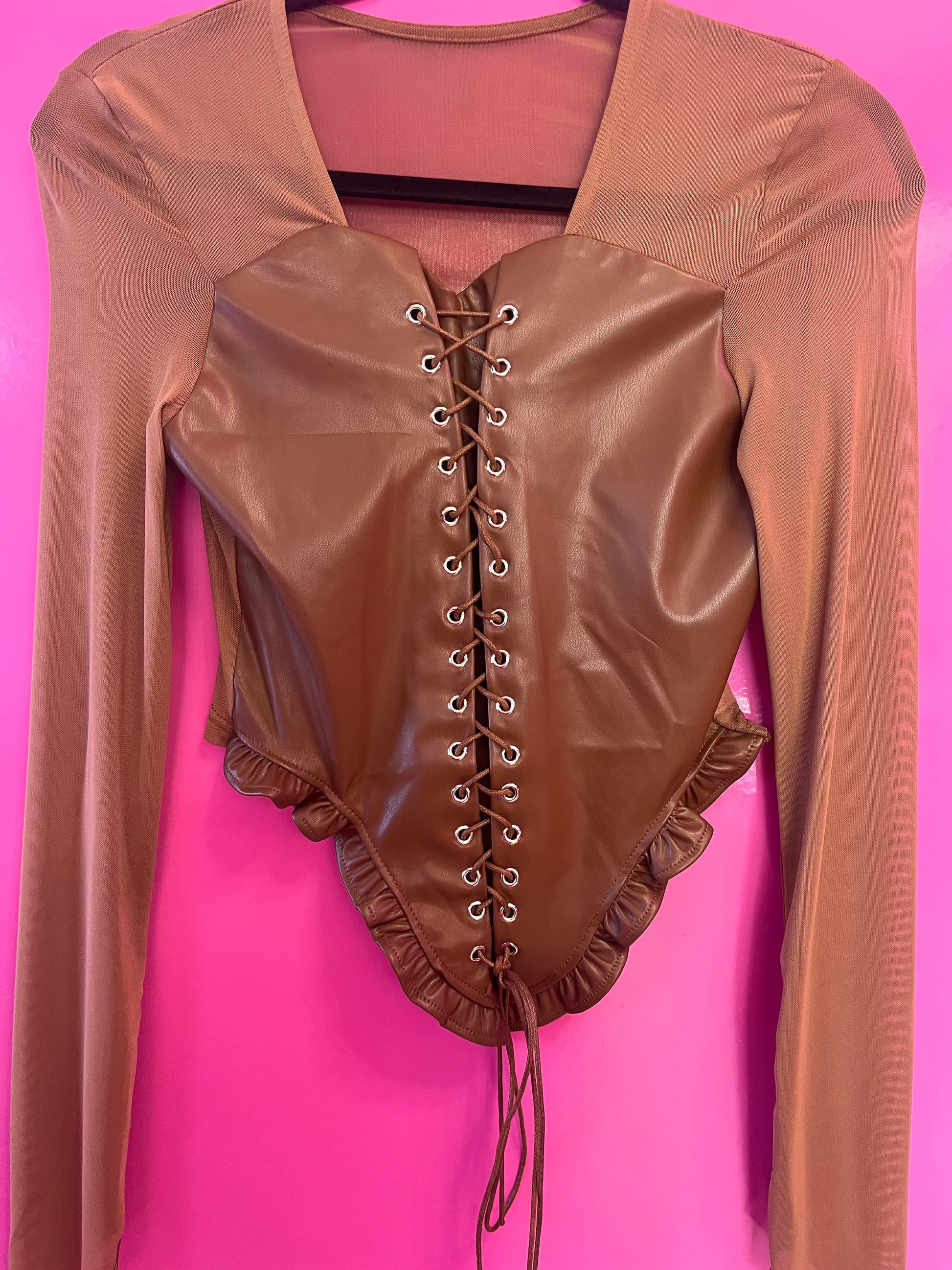 Blusa vinipiel tipo corset