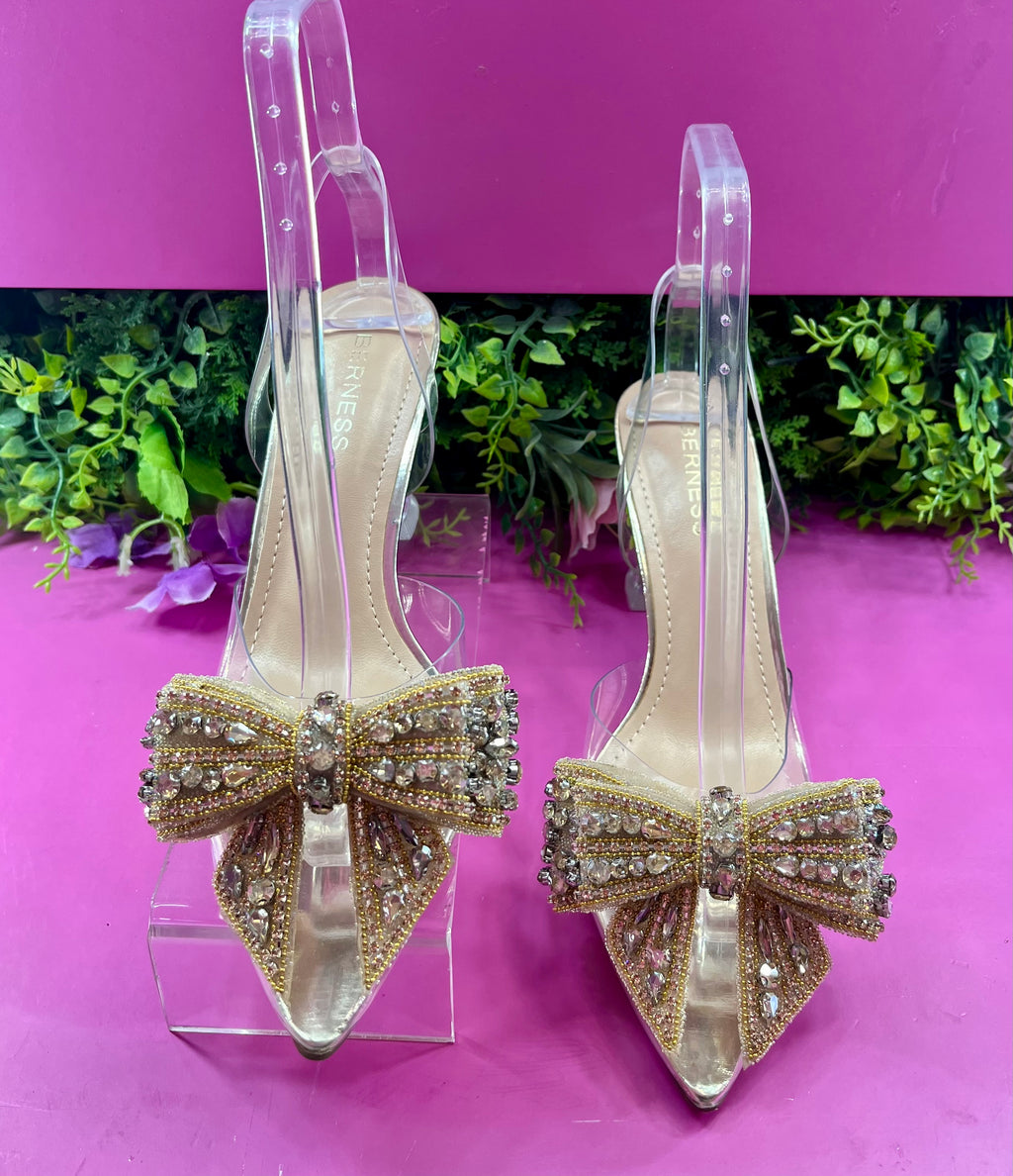 Zapatillas con moño dorado niña