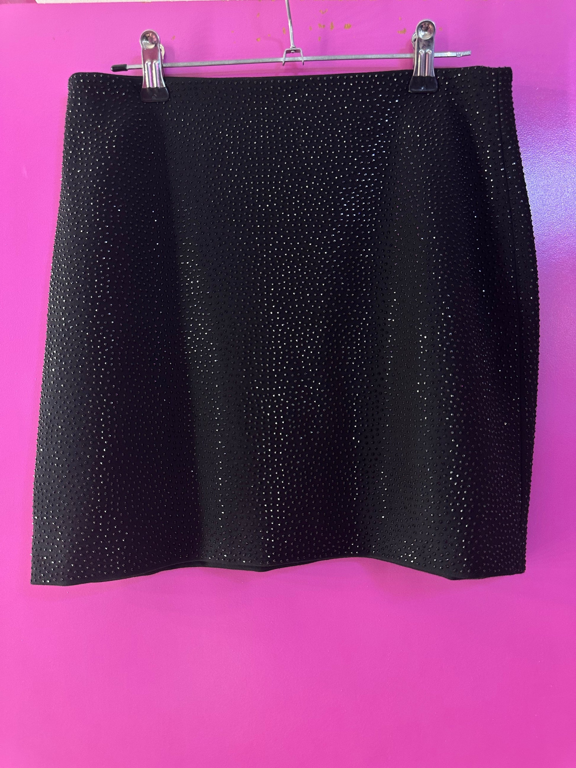 Falda negra de brillos