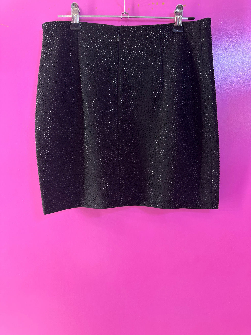 Falda negra de brillos